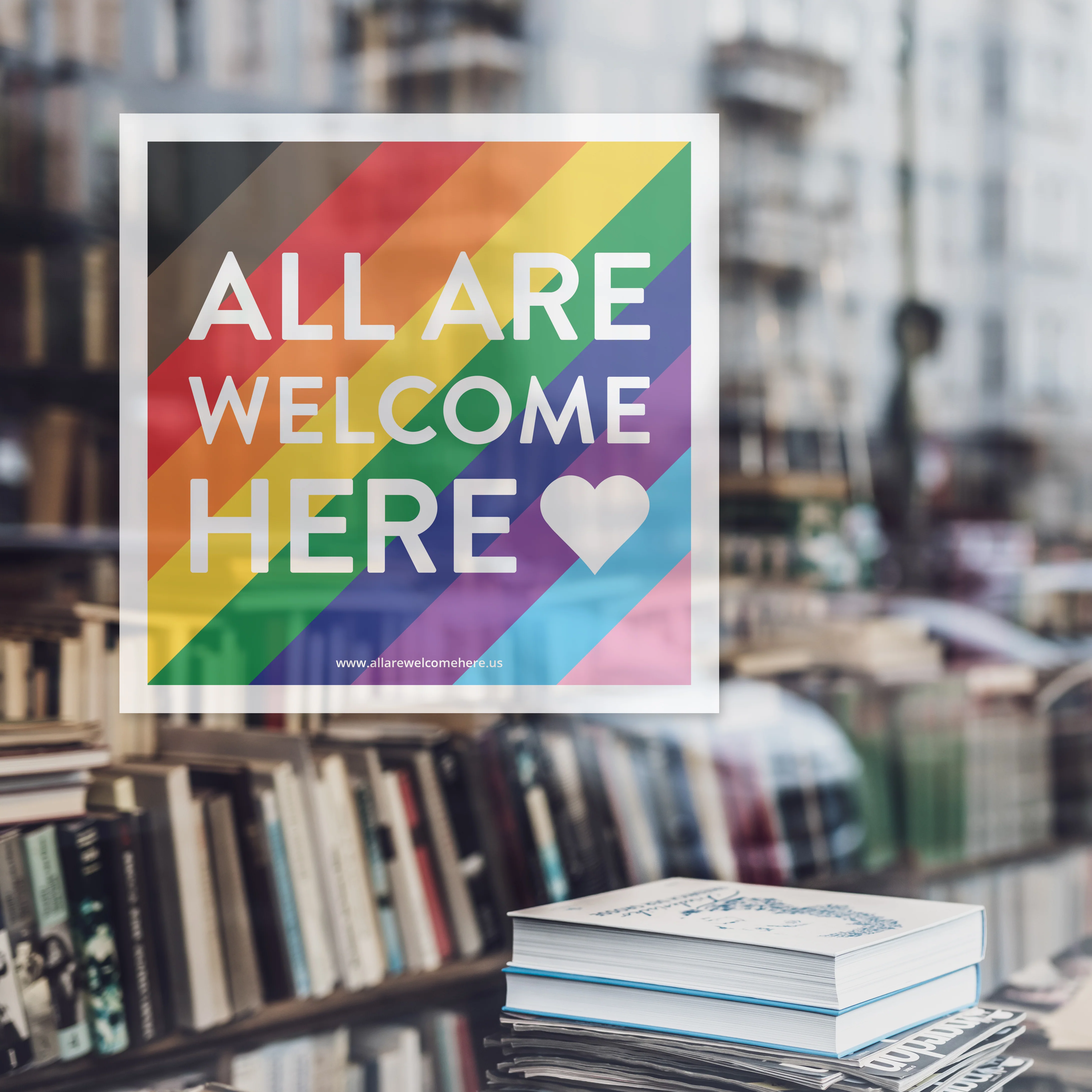 Progressive pride window cling on a storefront